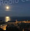 A màghjina - A luna di a neve sopra Bastia 